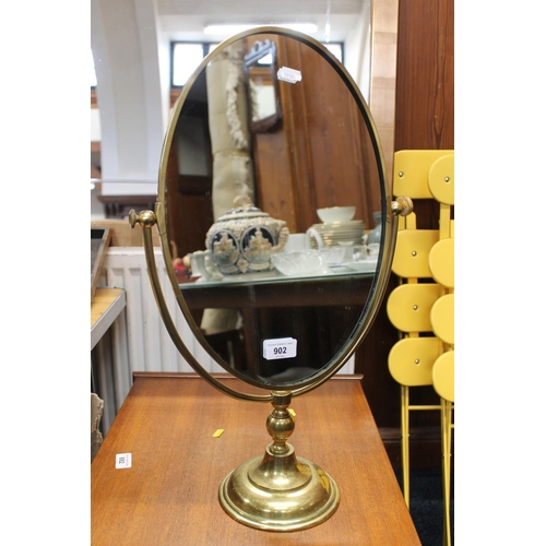 902 - Brass dressing table swing mirror.