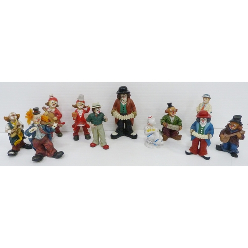 1 - Collection of painted wood and resin clown figures, some musical-themed examples, a collection of Da... 