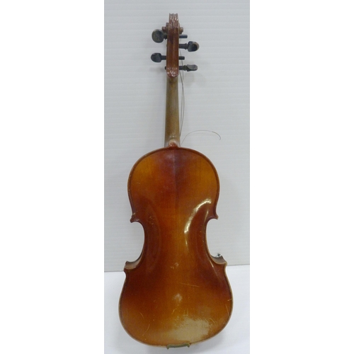 17 - European-made violin after Stradivarius, bearing a Stradivarius label, in an early 20th century case... 