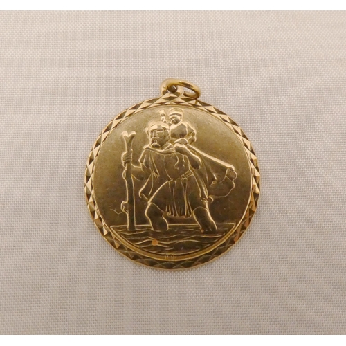 20 - 9ct gold St Christopher pendant and another small 9ct gold pendant, 4.4g gross.  (2)