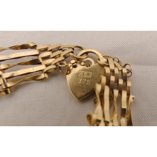 21 - 9ct gold gate bracelet with padlock attachment, approximately 7.5cm diameter, 4.5g.