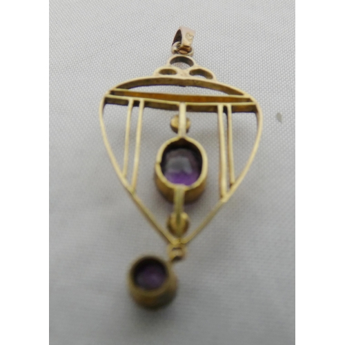 27 - 9ct gold amethyst and seed pearl lady's openwork pendant of Art Nouveau style, with amethyst stone a... 