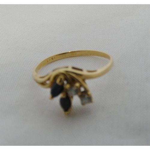 28 - 18ct gold lady's ring set with synthetic stones, size L, 1.7g gross.