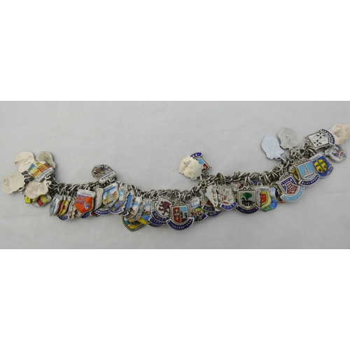 34 - Sterling silver (925) and enamel bracelet set with multiple enamel crested pendants of mainly Scotti... 