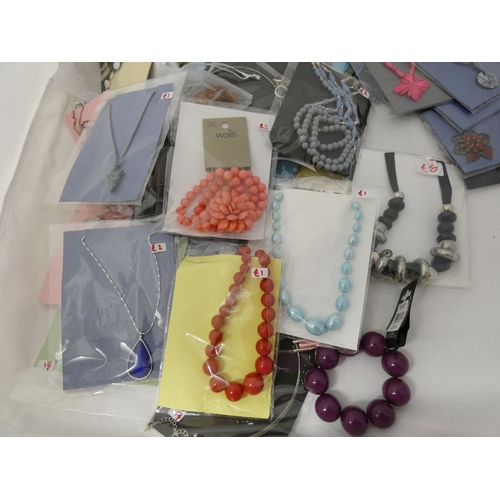 44 - Quantity of ladies' costume jewellery, mainly bead-style necklaces, mostly in original packaging.