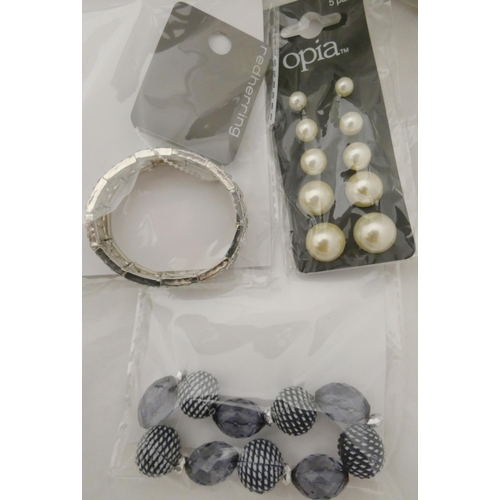 48 - Quantity of ladies' costume jewellery, mainly chains and pendants, mostly in original packaging.