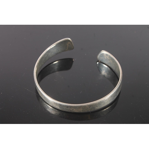 776 - Hans Hansen of Denmark, a silver modernist design bangle, 45g.