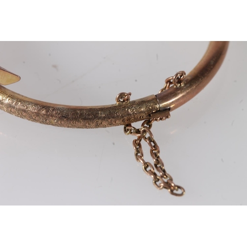 778 - Baby's 8ct gold bangle, the clasp stamped '333', 3.8g.