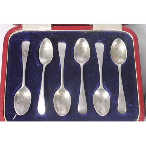 825 - Set of six hallmarked silver teaspoons, pair of silver napkin rings and a silver fork and spoon chri... 