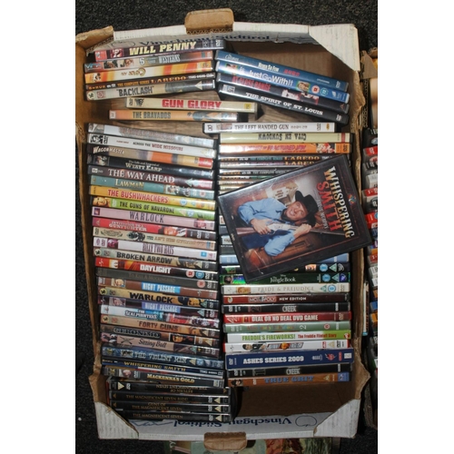 349 - Three boxes of DVDs to include John Wayne along with Western film books, etc.