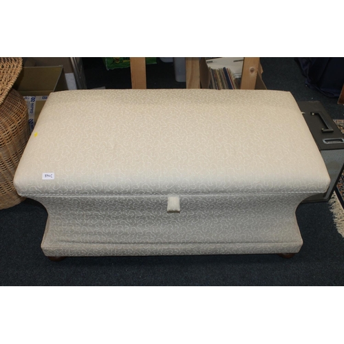 894C - Upholstered ottoman.