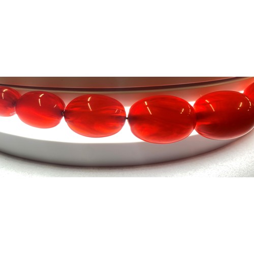 78 - Cherry amber string of graduated beads, 76cm long, 73.8g.