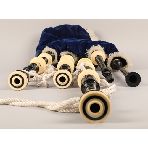 210 - Set of Ivory Mounted bagpipes, unsigned, turned black hardwood with ivory mounts, blue velvet bag in... 