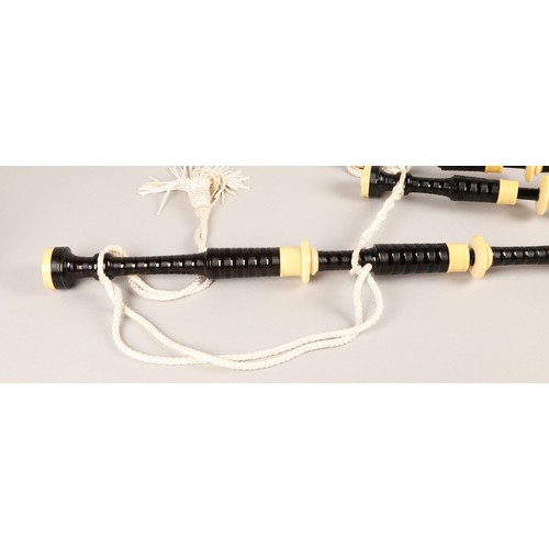 210 - Set of Ivory Mounted bagpipes, unsigned, turned black hardwood with ivory mounts, blue velvet bag in... 