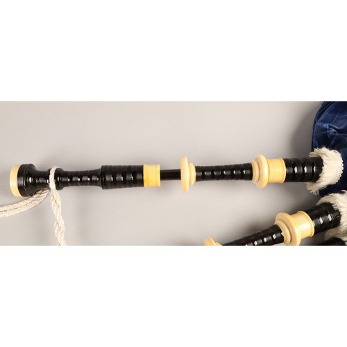 210 - Set of Ivory Mounted bagpipes, unsigned, turned black hardwood with ivory mounts, blue velvet bag in... 