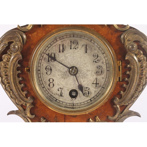 283 - German Lenzkirch mantel clock, early 20th century, the rococo shaped case with urn finial, applied b... 