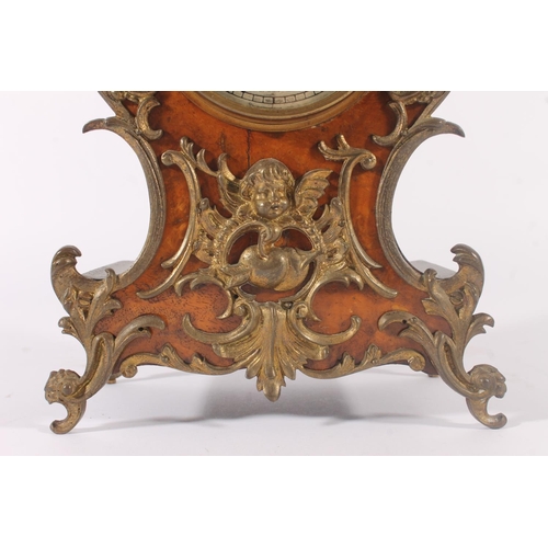 283 - German Lenzkirch mantel clock, early 20th century, the rococo shaped case with urn finial, applied b... 