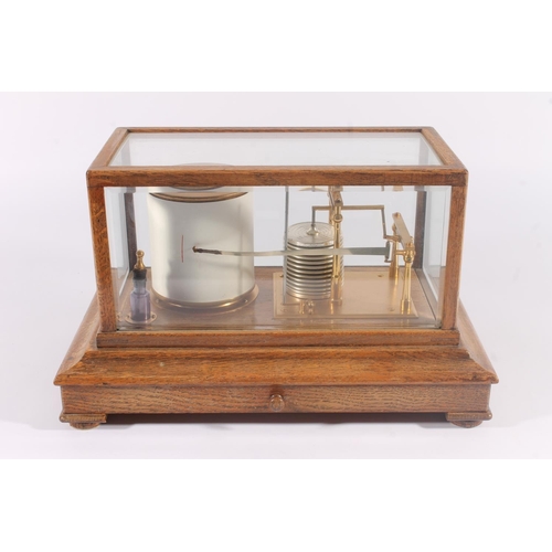 292 - Barograph in glazed oak case with lift-off lid, Short & Mason of London, with spare charts, W36.... 