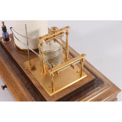 292 - Barograph in glazed oak case with lift-off lid, Short & Mason of London, with spare charts, W36.... 