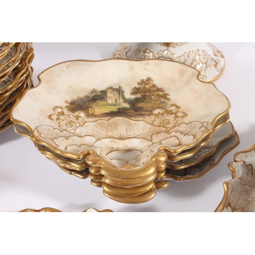 307 - English porcelain dinner ware, 19th century, the shaped gilt and white bodies painted with landscape... 