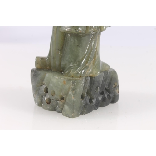 323 - Chinese spinach jade figurine of an attendant, H23cm.