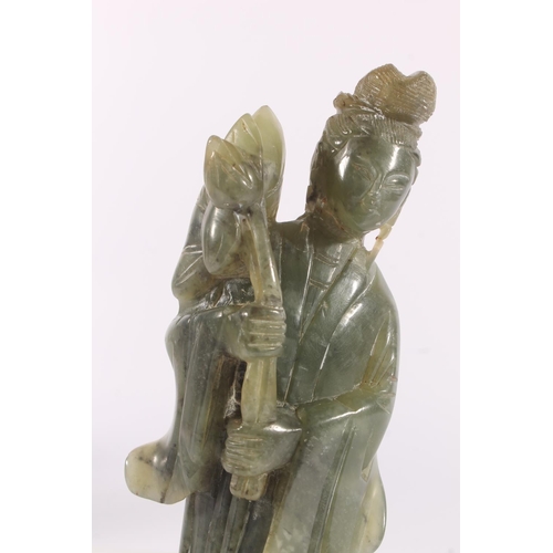 323 - Chinese spinach jade figurine of an attendant, H23cm.