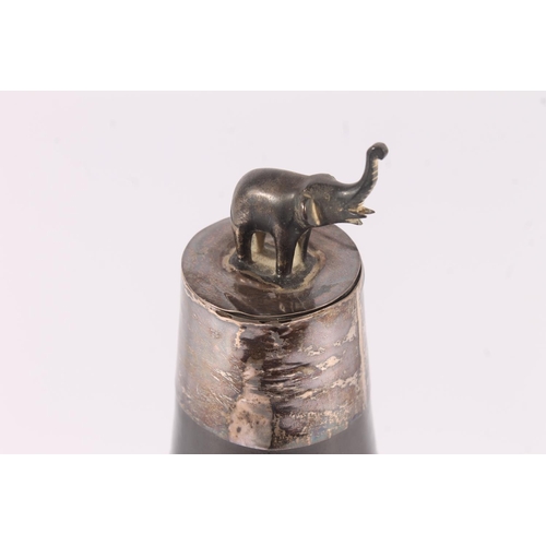 324 - Indian pottery and metal bound water bottle, early 20th century, the elephant finial lid over a tape... 