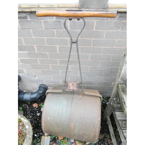 464 - 1900s iron lawn roller with wooden handle by F.I Co Ltd. Height 123cm. 