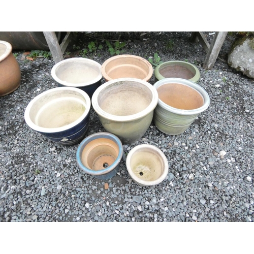 470 - Eight glazed pottery plant pots. (8)