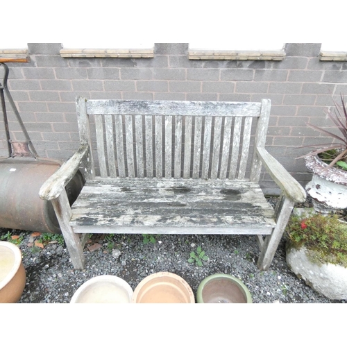 474 - Wooden garden bench by Nova Garden Furniture. Height 94cm, Width 131cm, Depth 62cm. 