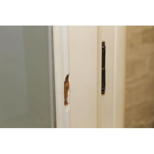 848 - Heavy white painted Laura Ashley dresser with glazed front on pedestal cupboard, H220cm.