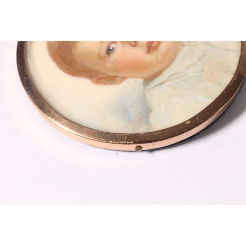 749 - Portrait miniature of a young boy in gilt metal frame and blue leatherette case.