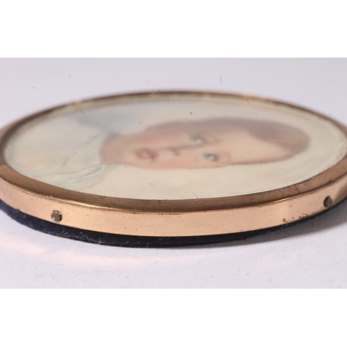 749 - Portrait miniature of a young boy in gilt metal frame and blue leatherette case.