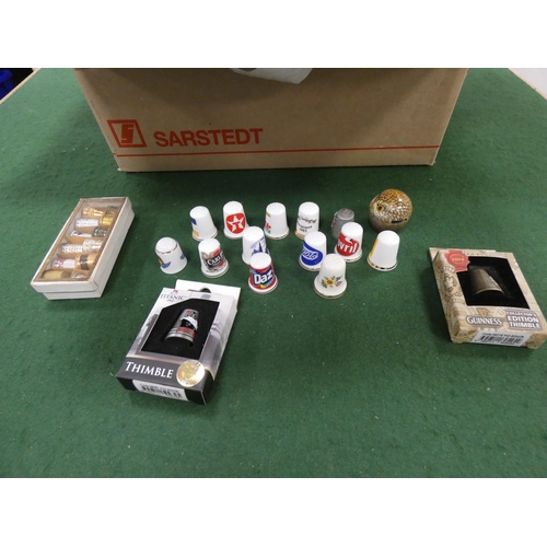 101 - Carton containing a large collection of porcelain thimbles, some with certificates of authenticity.