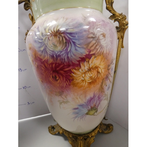 115 - Bonn of Germany porcelain vase with floral decoration and ormolu-style gilt metal liner.