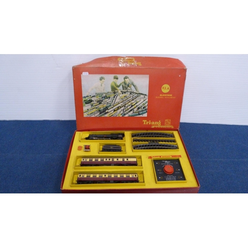 12 - Tri-ang OO gauge electric model railway, R3.A, boxed, containing loco, tender, coaches and track.