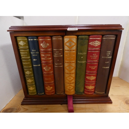 137 - Mahogany apprentice-style cabinet, the doors in the form of book spines etc.