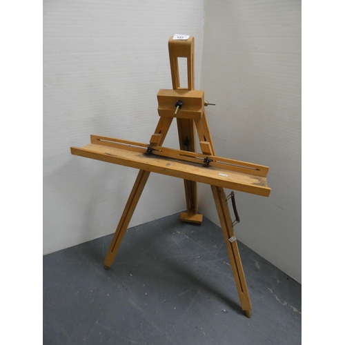 153 - Studio art piece with wooden easel.