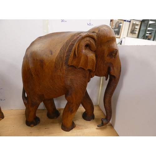 172 - Indian-style hardwood elephant family group of three.