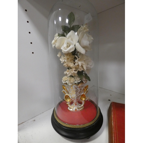 195 - Ceramic vase in glass dome case on Victorian-style ebonised stand, four assorted books to include 'T... 