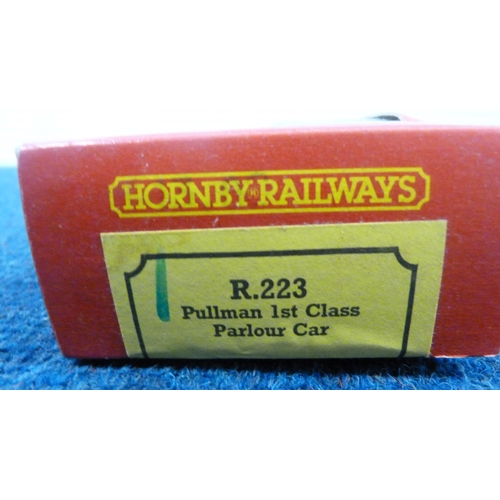 21 - Carton containing Hornby OO gauge model railway accessories to include a boxed R.223 Pullman First C... 