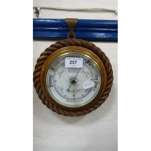 257 - Oak-framed aneroid barometer retailed by Shadburn of Sheffield.