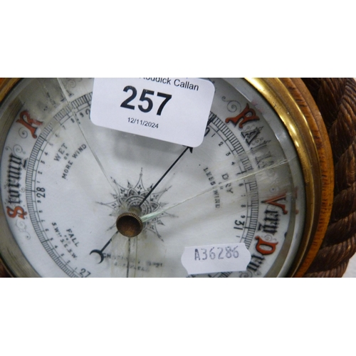 257 - Oak-framed aneroid barometer retailed by Shadburn of Sheffield.