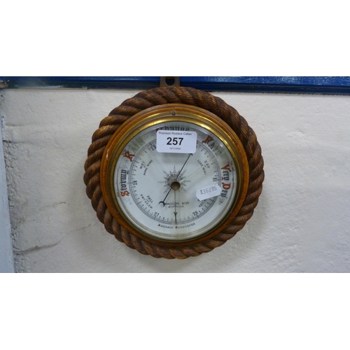 257 - Oak-framed aneroid barometer retailed by Shadburn of Sheffield.