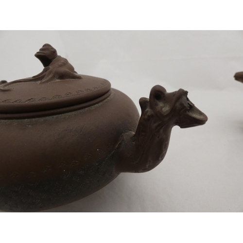 269 - Two Chinese Yixing clay teapots and covers.  (2)