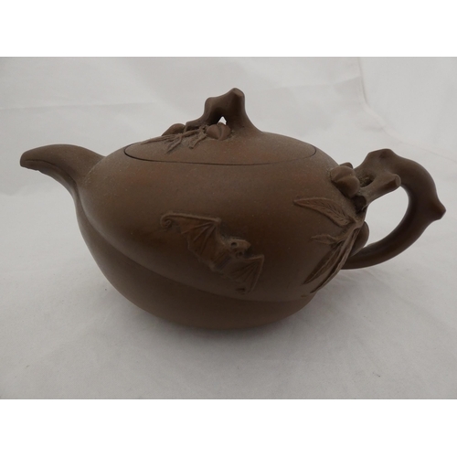 269 - Two Chinese Yixing clay teapots and covers.  (2)