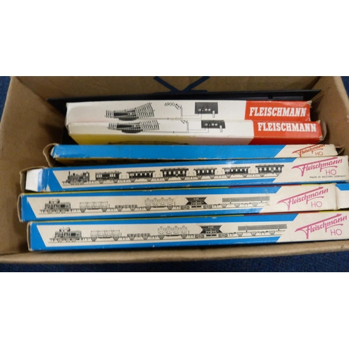 27 - Six cartons containing various model railway scale buildings, track, accessories etc.