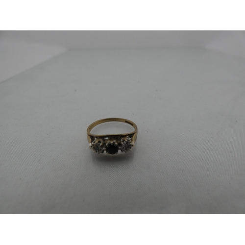 297 - 9ct gold gem-set three-stone dress ring, set with small stones, 2g gross.