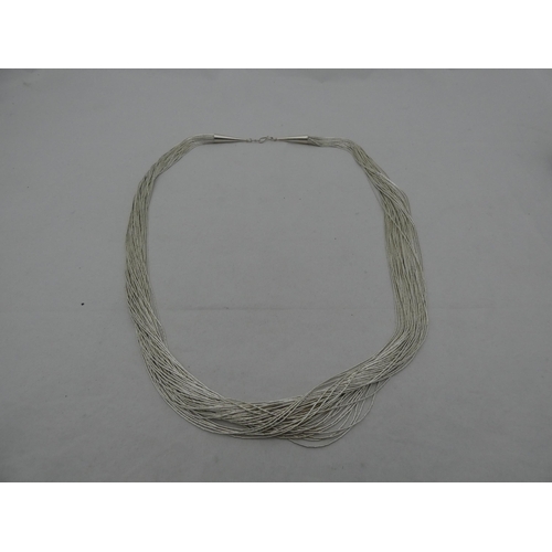 305 - Sterling silver wire chain with pendant, approximately 66g gross.