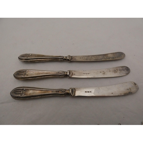 313 - Set of six Continental silver coffee spoons, stamped '900', 44g, three silver-handled butter knives,... 